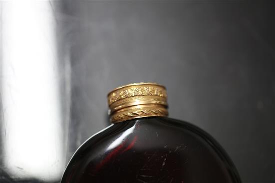 A 19ct century gold topped moon shaped ruby glass scent bottle, 3.25in.